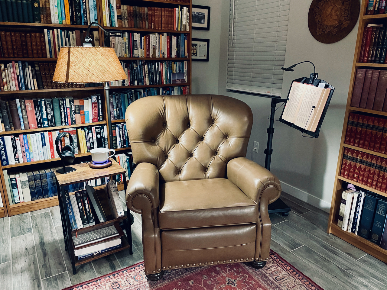 Library with recliner and Levo hands-free book stand